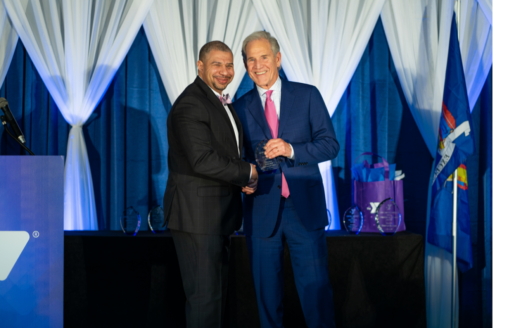 Bruce Bell receiving YMCA President's Award